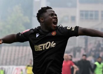 Liberian forward Emmanuel Sieh celebrating after helping Čelik Zenica secure promotion in Bosnia
