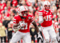 Emmett Johnson in action during a college football game before being drafted by the Kansas City Chiefs