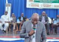 Central Bank Governor Henry F. Saamoi speaks at the launch of the Liberia National Student Economic Hub at the University of Liberia.
