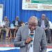 Central Bank Governor Henry F. Saamoi speaks at the launch of the Liberia National Student Economic Hub at the University of Liberia.