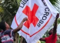 Liberia National Red Cross flag being hoisted