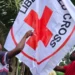 Liberia National Red Cross flag being hoisted