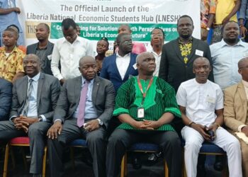 Finance Minister Augustine Ngafuan, Central Bank Governor Henry Saamoi and students attend the launch of the Liberia National Economic Student Hub at the University of Liberia.