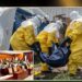 Health workers in protective suits handle an Ebola victim as Liberia lawmakers raise concerns over renewed Ebola threats from DR Congo.