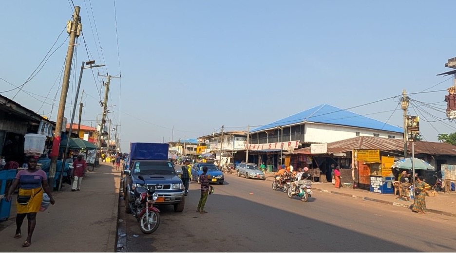 A busy Monrovia street scene illustrating daily economic life and the struggle for survival in Liberia.