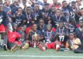 Charity High School players celebrate with trophies after winning double titles in Paynesville
