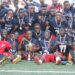 Charity High School players celebrate with trophies after winning double titles in Paynesville