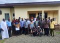 Officials and stakeholders gather during county treasury decentralization meeting in Bomi County