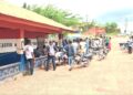 Motorcyclists gathered outside Gbarnga police station amid investigation into detainee death