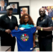Youth and Sports Minister Cornelia Kruah poses with members of the FIBA Zone-3 delegation and Jordan Nwora Foundation representatives in Paynesville