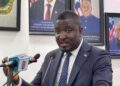 Deputy Minister Daniel O. Sando speaks at press briefing criticizing former President George Weah
