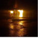 A house engulfed in flames during a deadly midnight fire in Gbarnga, Bong County
