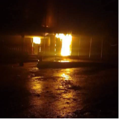 A house engulfed in flames during a deadly midnight fire in Gbarnga, Bong County