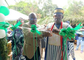 Officials and community leaders cut the ribbon during the dedication of the new Arthington Clinic in rural Montserrado County