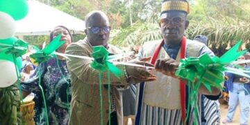 Officials and community leaders cut the ribbon during the dedication of the new Arthington Clinic in rural Montserrado County
