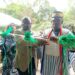 Officials and community leaders cut the ribbon during the dedication of the new Arthington Clinic in rural Montserrado County