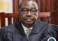 Liberia Justice Minister Oswald Tweh during a press conference in Monrovia