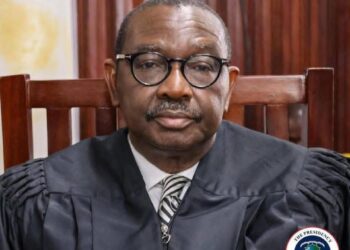 Liberia Justice Minister Oswald Tweh during a press conference in Monrovia