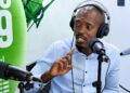 Labour activist George Sahr Tengbeh speaking during a radio interview in Monrovia