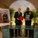 Liberian and Moroccan officials pose with signed documents during a diplomatic meeting focused on bilateral cooperation and security relations.