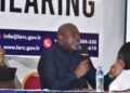 A Liberia Electricity Regulatory Commission official speaks during a public hearing on electricity regulation and energy sector accountability in Monrovia.