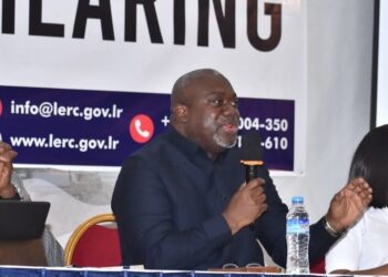 A Liberia Electricity Regulatory Commission official speaks during a public hearing on electricity regulation and energy sector accountability in Monrovia.