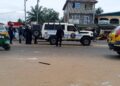 Liberia National Police officers responding to unrest in Gardnersville following a confrontation with residents.