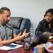 Youth and Sports Minister Cornelia Kruah meets with Lone Star head coach Mohamed Adil Erradi to discuss Liberia's AFCON 2027 qualification strategy.