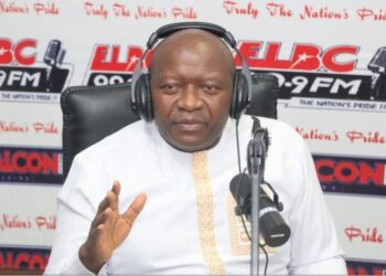 Finance Minister Augustine Kpehe Ngafuan speaking during a radio interview on Liberia's public debt stock and debt servicing obligations.