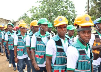 Graduates of River Gee Technical College wearing safety helmets and technical training uniforms during activities linked to the institution's first commencement program.