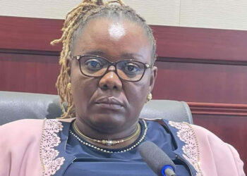 Former Public Works Minister Ruth Cooker-Collins speaks about the CDC government's role in developing southeastern Liberia road projects during the CDC's 22nd anniversary celebration in Zwedru.