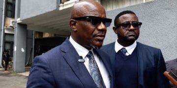 LNBA Vice President Counselor Abrahim B. Sillah addresses reporters after appearing before the Senate Judiciary Committee to discuss Liberia's proposed War Crimes and Anti-Corruption Court bills.