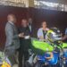 Officials from the United Nations, European Union and INCHR inspect newly donated motorcycles and equipment during a handover ceremony in Monrovia.