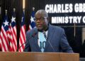 Information Minister Jerolinmek Piah speaks during a government press briefing while defending the Boakai administration's performance against criticism from opposition figure Eugene Nagbe.