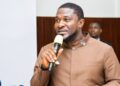 Siafa Bahn Kemokai II delivers the keynote address during the inauguration of the Federation of Liberian Youth leadership in Monrovia.