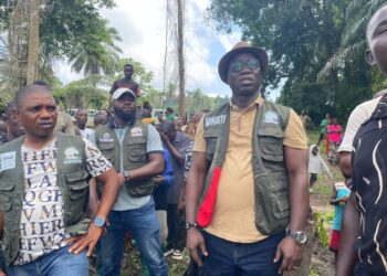 Agriculture Minister J. Alexander Nuetah meets farmers during a tour of farming communities in Nimba County.