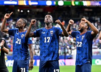Players from African national teams celebrate after qualifying for the Round of 32 at the 2026 FIFA World Cup.