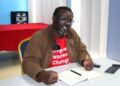 ActionAid International Secretary General Arthur Larok speaking during a press engagement in Monrovia.