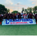 Players and officials of Professional Sports Academy celebrate winning the Montserrado County Third Division League title in Liberia.