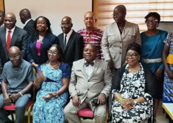 Stakeholders pose for a group photo during the validation of Liberia's proposed National Housing Authority Bill in Monrovia.