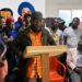 CDC Youth League Vice Chair Alvin C. Wessah addresses a press conference in Monrovia concerning the death of businessman Ivan Tumbey.
