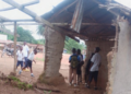 Students sit inside a dilapidated mud hut in Borkeza Junction, Zorzor District, after a fire destroyed their only elementary school in Lofa County.