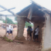 Students sit inside a dilapidated mud hut in Borkeza Junction, Zorzor District, after a fire destroyed their only elementary school in Lofa County.