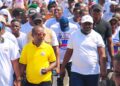 CMC Political Leader Musa Hassan Bility walks with supporters during the launch of the party's recruitment and mobilization campaign in Monrovia.
