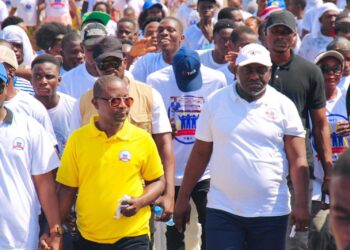 CMC Political Leader Musa Hassan Bility walks with supporters during the launch of the party's recruitment and mobilization campaign in Monrovia.