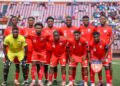 Liberia national football team players pose for a team photograph before an international match.
