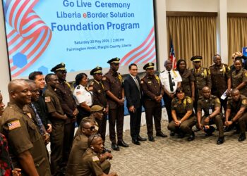 Liberia Immigration Service officials, government representatives and international partners attend the launch of the e-Border Solution Foundation Pilot Project in Margibi County.
