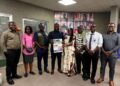 National Port Authority officials and media representatives pose during an event marking the arrival of Liberia's largest cargo vessel at the Freeport of Monrovia.