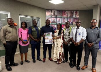 National Port Authority officials and media representatives pose during an event marking the arrival of Liberia's largest cargo vessel at the Freeport of Monrovia.
