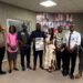 National Port Authority officials and media representatives pose during an event marking the arrival of Liberia's largest cargo vessel at the Freeport of Monrovia.